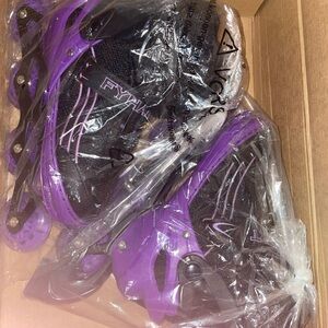 Purple and Black Rollerblades